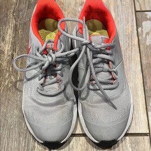 Nike Gray and Red Sneakers with Cushioned Comfort